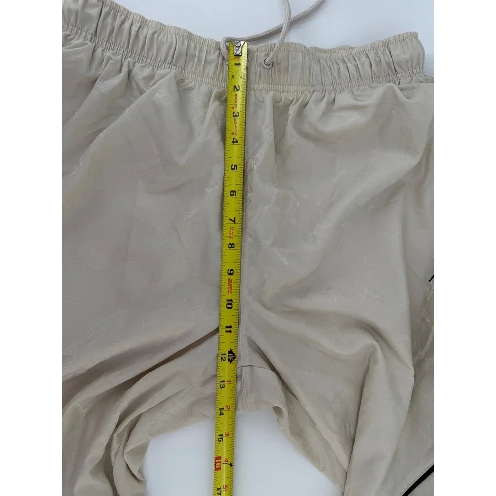 Nike Jordan Jumpman AOP Track Pants Mens M Beige Cream Wide Leg Adjustable Hem‎